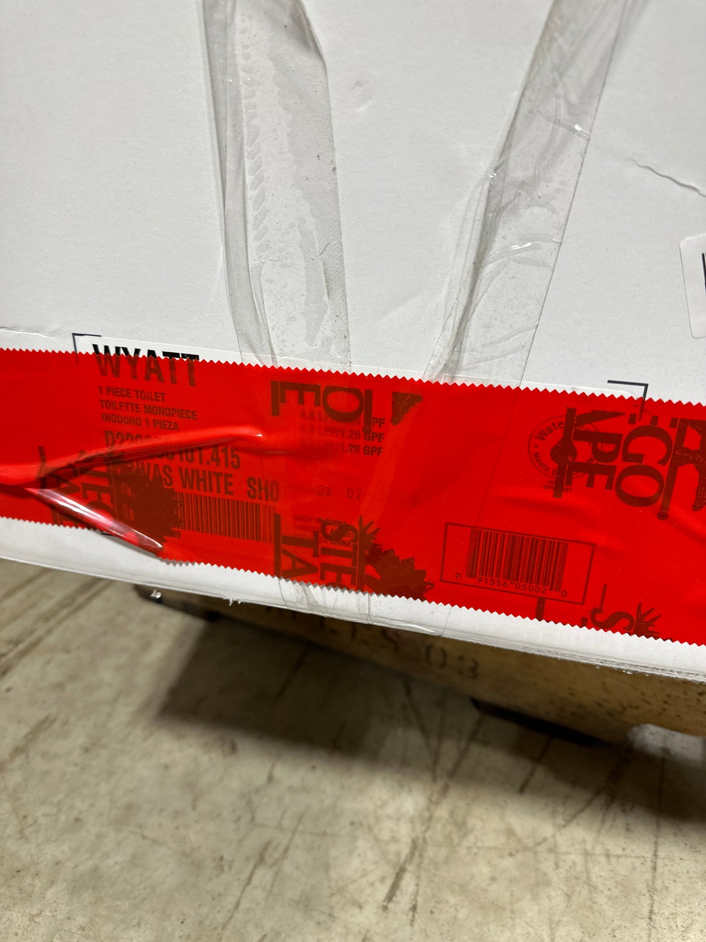 Wyatt 1-Piece 1.28 GPF Single Flush Elongated Toilet in Canvas White