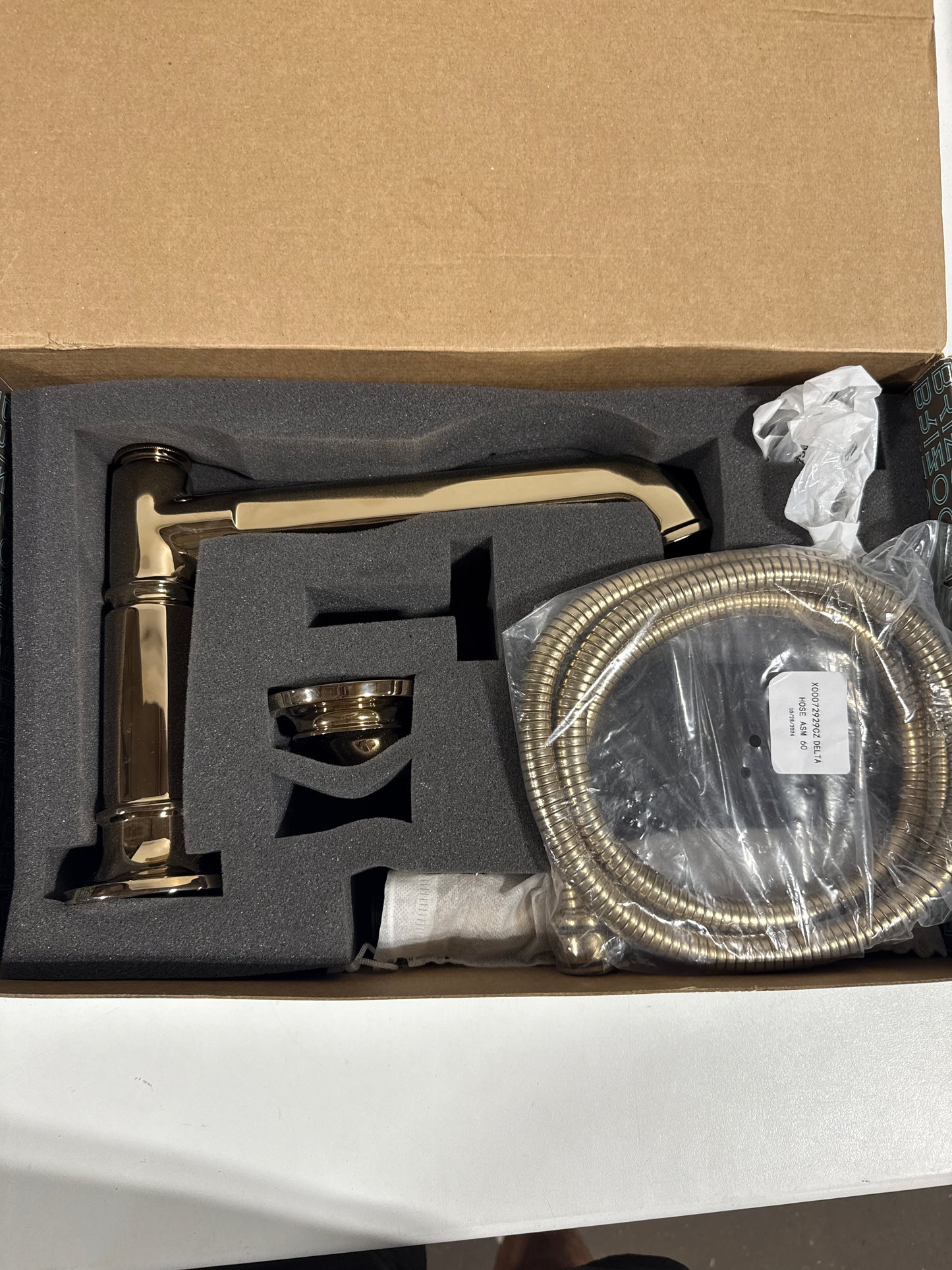 Brizo Invari Deck Mounted Roman Tub Filler with Built-In Diverter - Includes Hand Shower, Less Handles and Rough-In