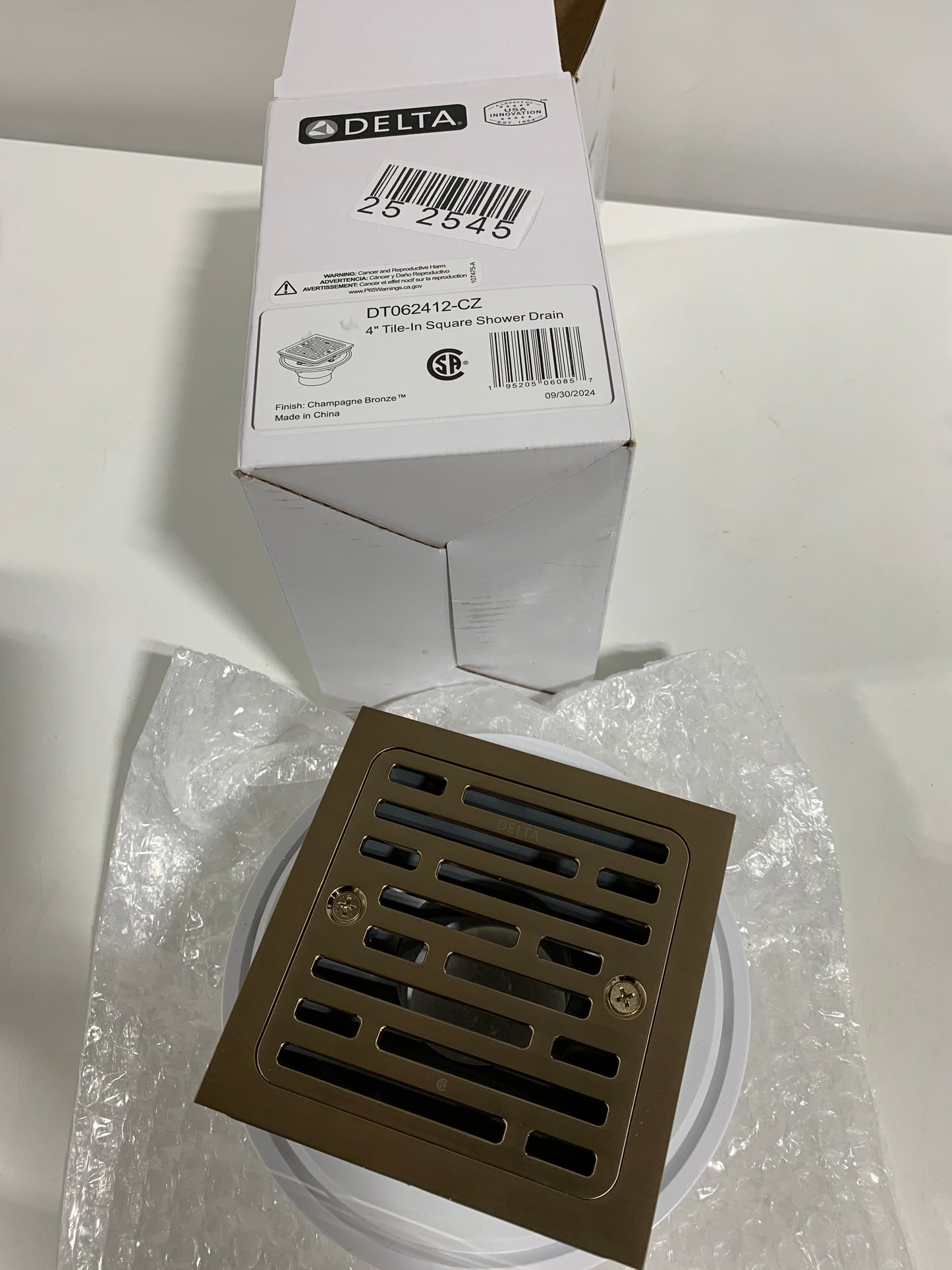 Delta DT062412 4" Tile-in Square Shower Drain Champagne Bronze Showers Shower Drains