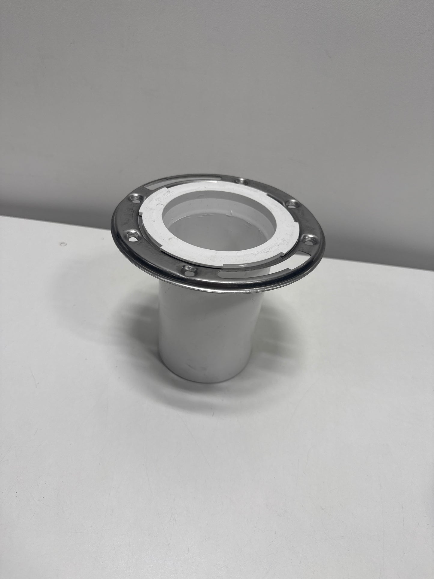 Jones Stephens 3 X 4 PVC Closet Flange W /SS Ring Less Knockout Model: C57334