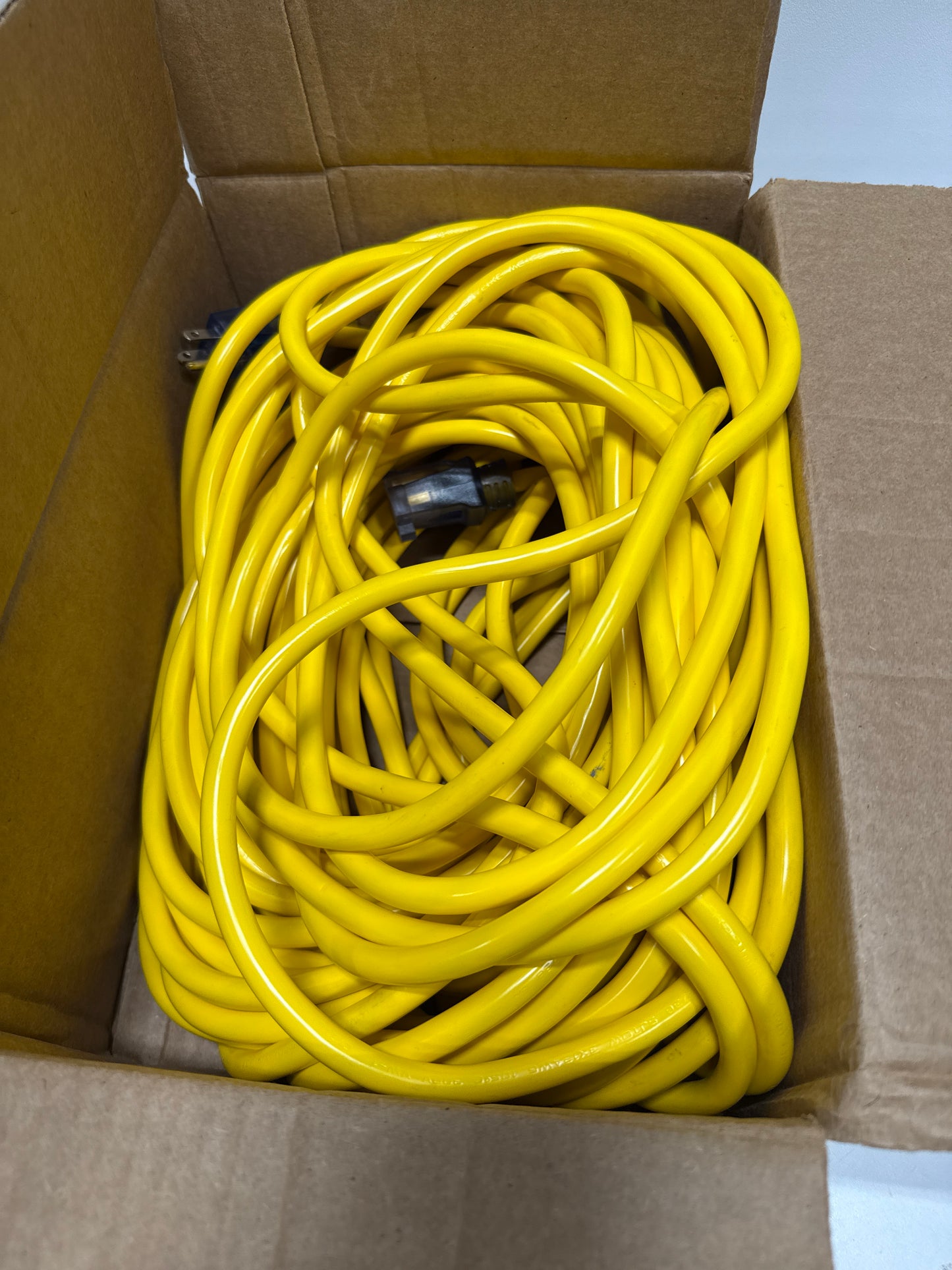 100 ft. 12/3 SJTOW Outdoor Oil Resistant Extension Cord with Power Indicator Light, Yellow