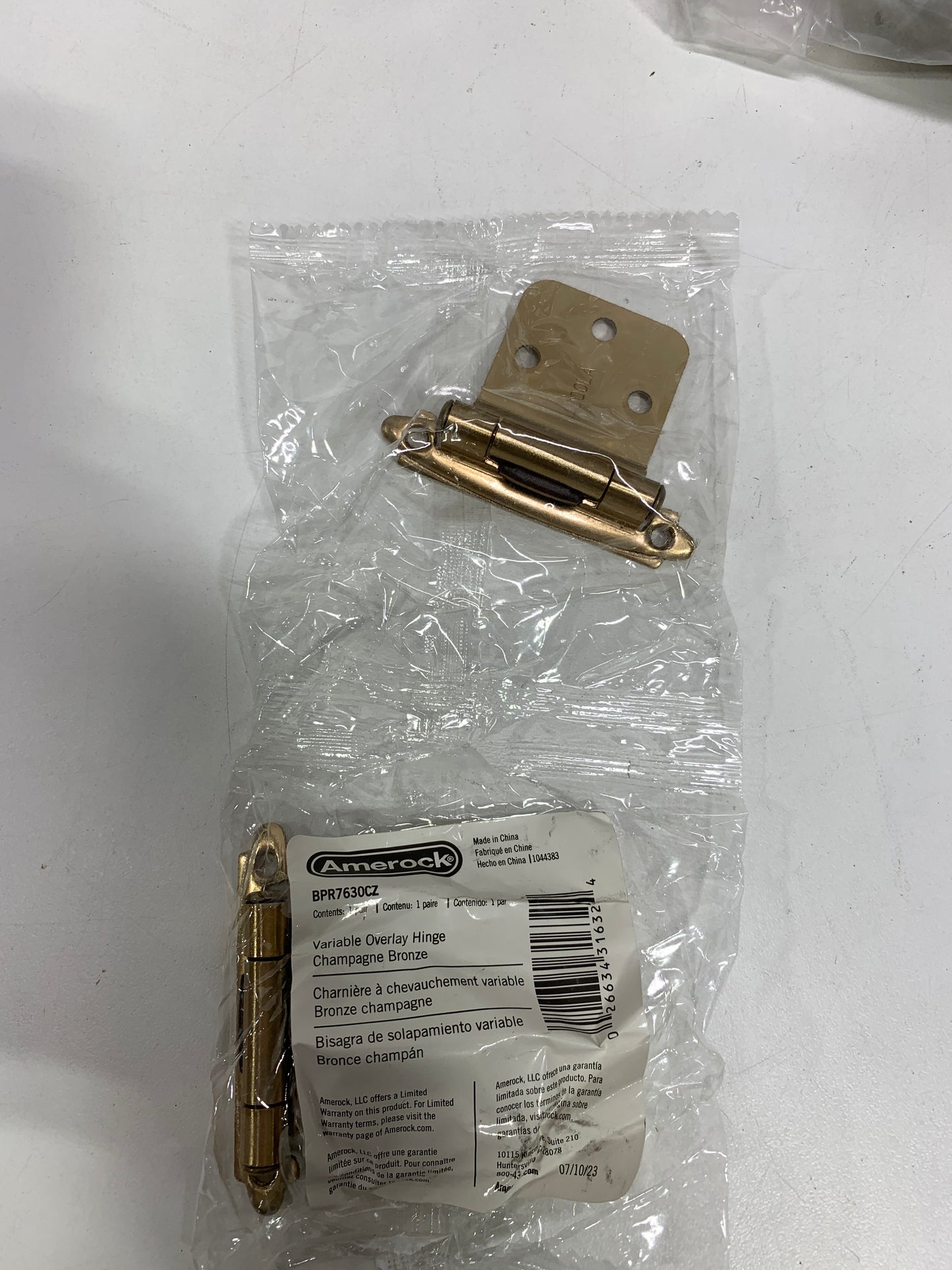 25 - Amerock BPR7630CZ | Reverse Bevel Face Frame Cabinet Hinge | Variable Overlay Self Closing Face Mount | Champagne Bronze | Kitchen Cabinet Door Hinge | 1 Pair/2 Pack