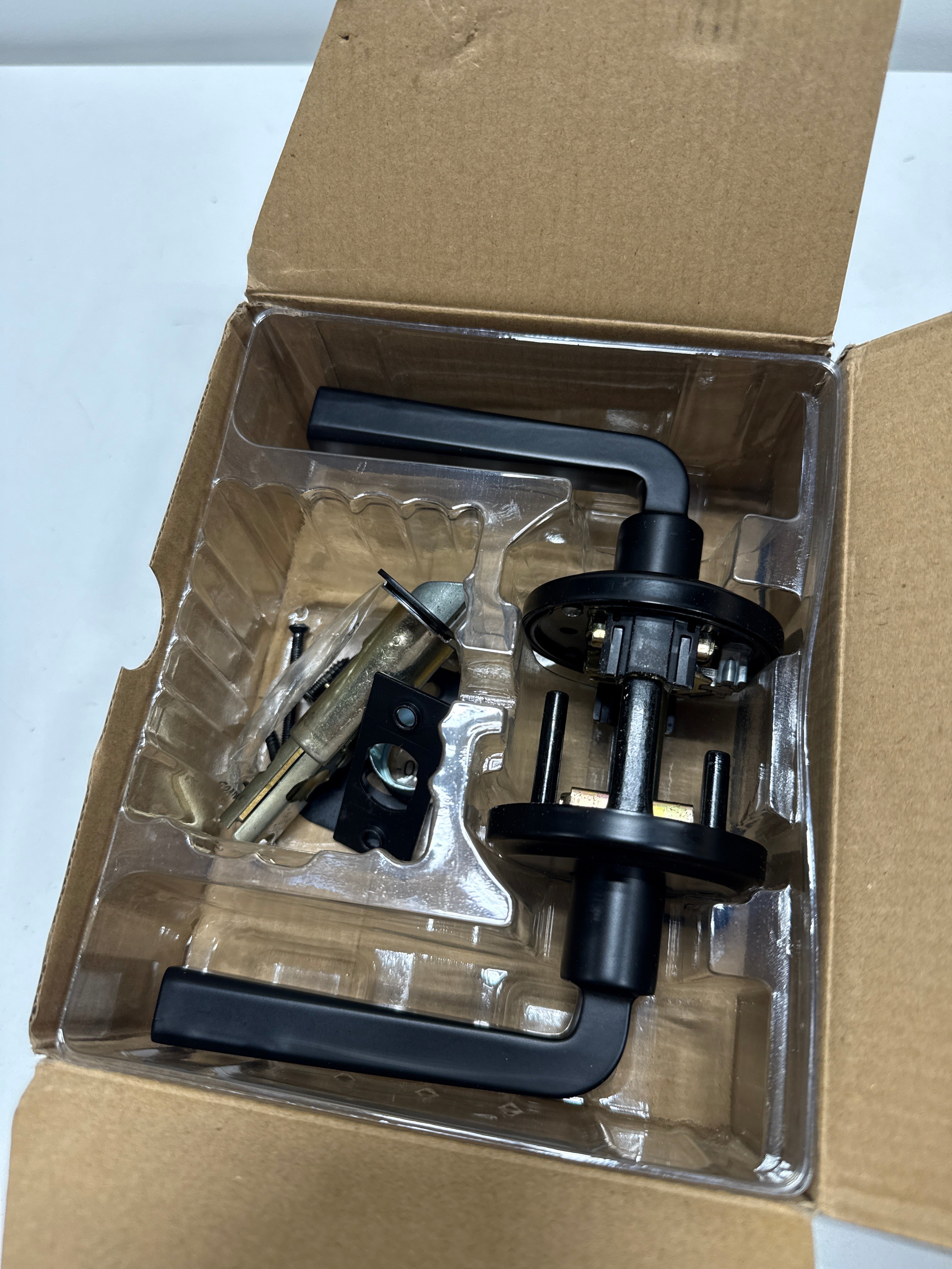 Kwikset 730TDL Trafford Privacy Door Lever Set with Round Rose Matte Black