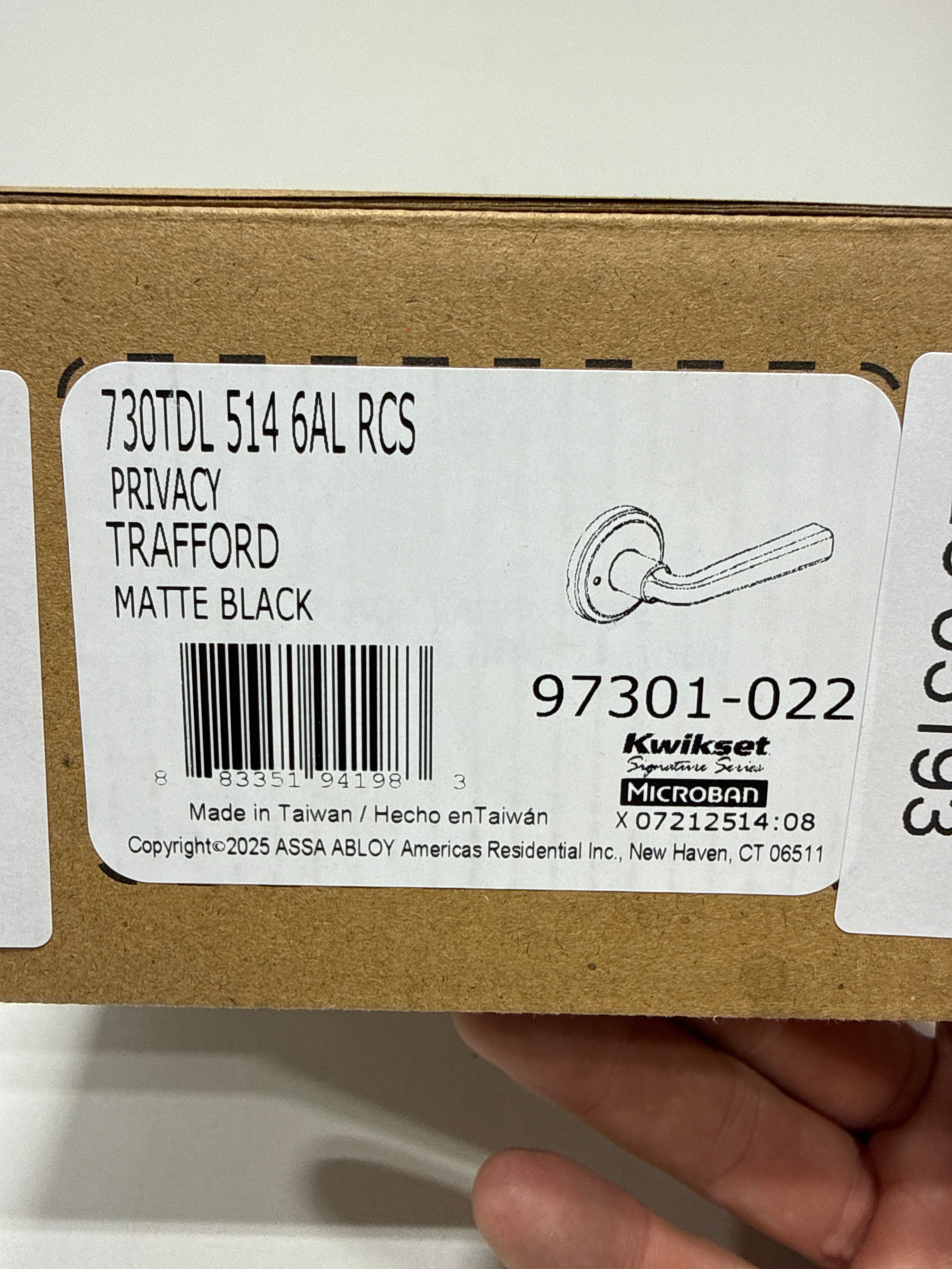 Kwikset 730TDL Trafford Privacy Door Lever Set with Round Rose Matte Black