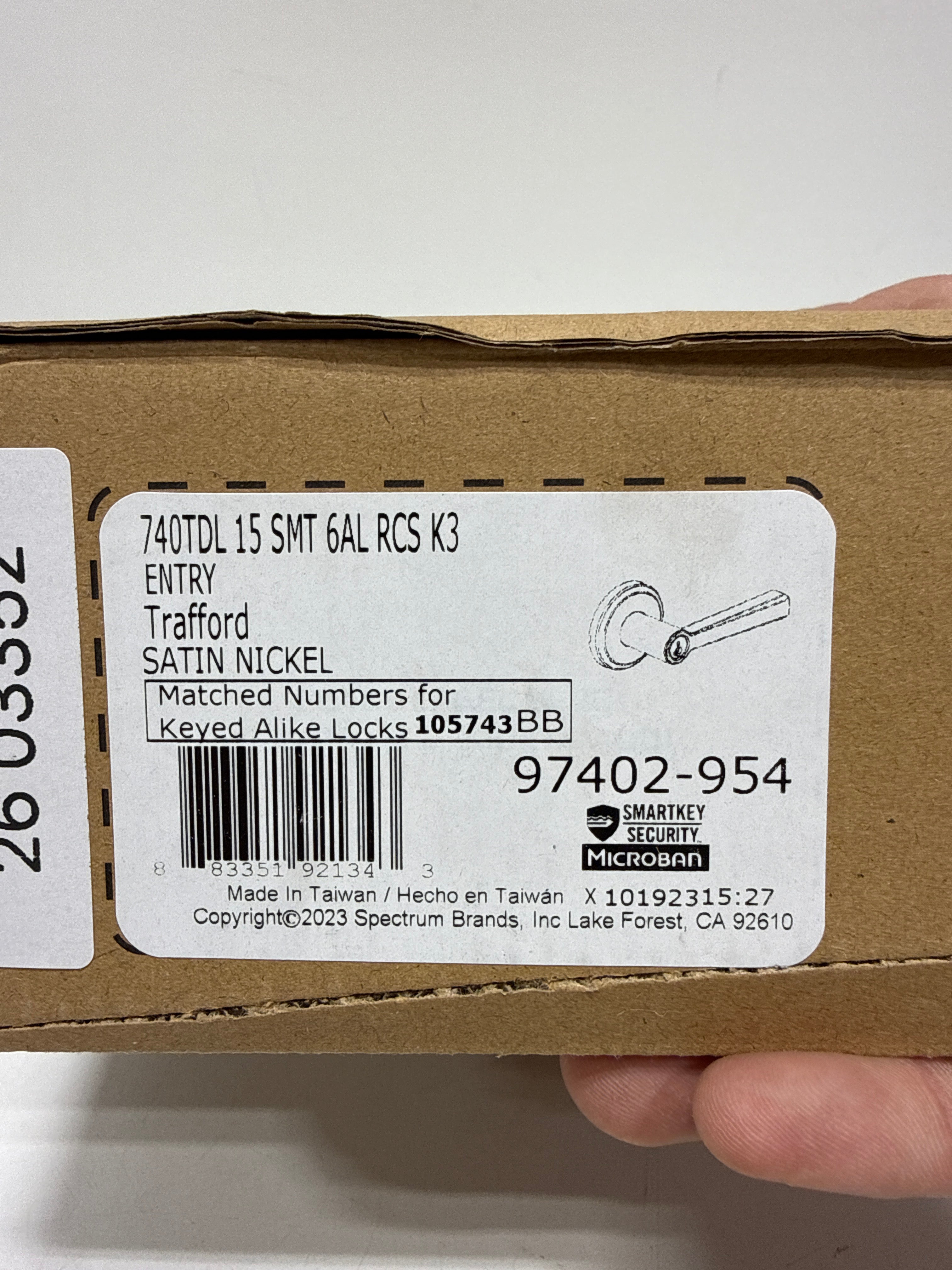 Trafford Lever Entry Door Lock SmartKey with 6AL Latch and RCS Strike Satin Nickel Finish