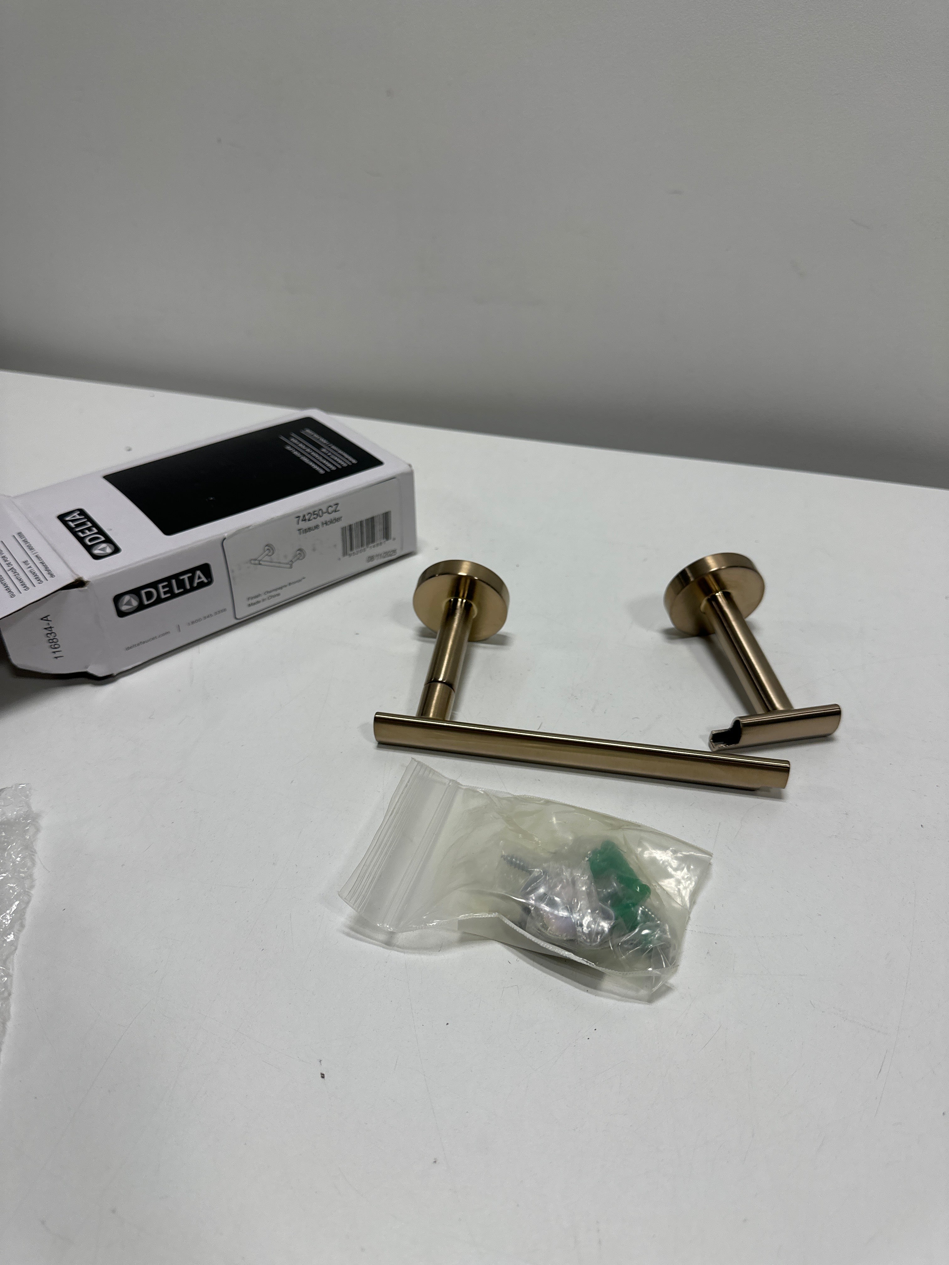 Delta 74250 Altado Wall Mounted Pivoting Toilet Paper Holder Champagne Bronze