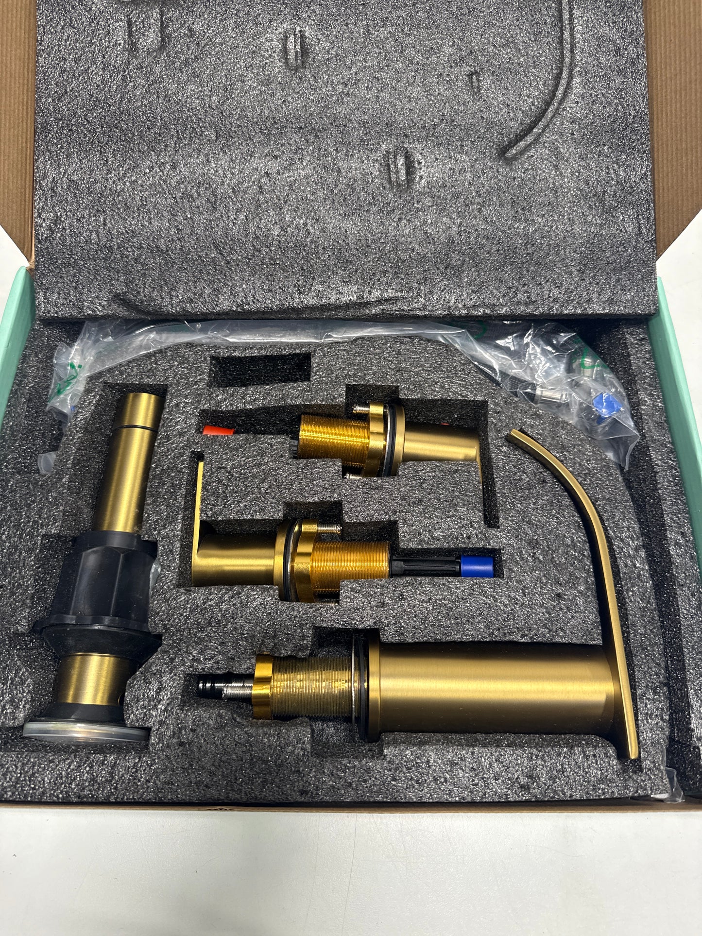 Androme 8 in. Widespread Double Handle Bathroom Faucet with Metal Drain in Gold