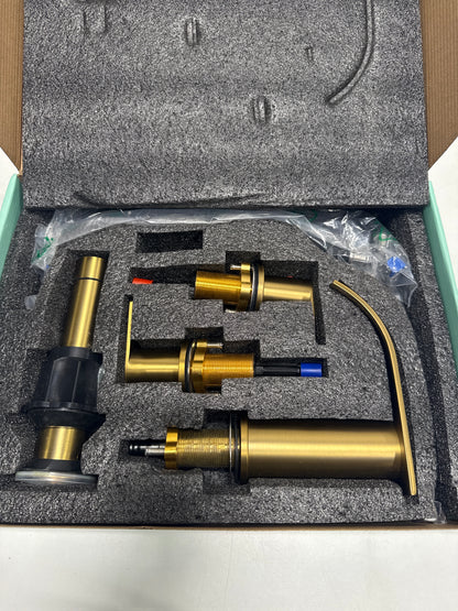 Androme 8 in. Widespread Double Handle Bathroom Faucet with Metal Drain in Gold