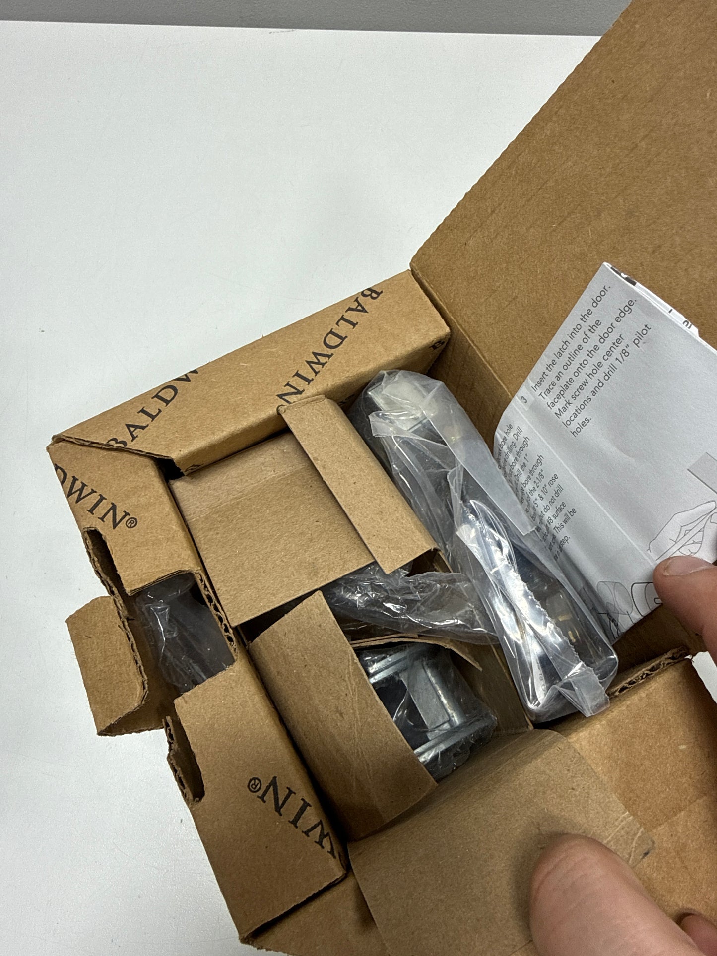 Baldwin 5057.PASS 5057 Passage Door Knob Set with 5048 Rose from the Estate Collection Non-Lacquered Brass