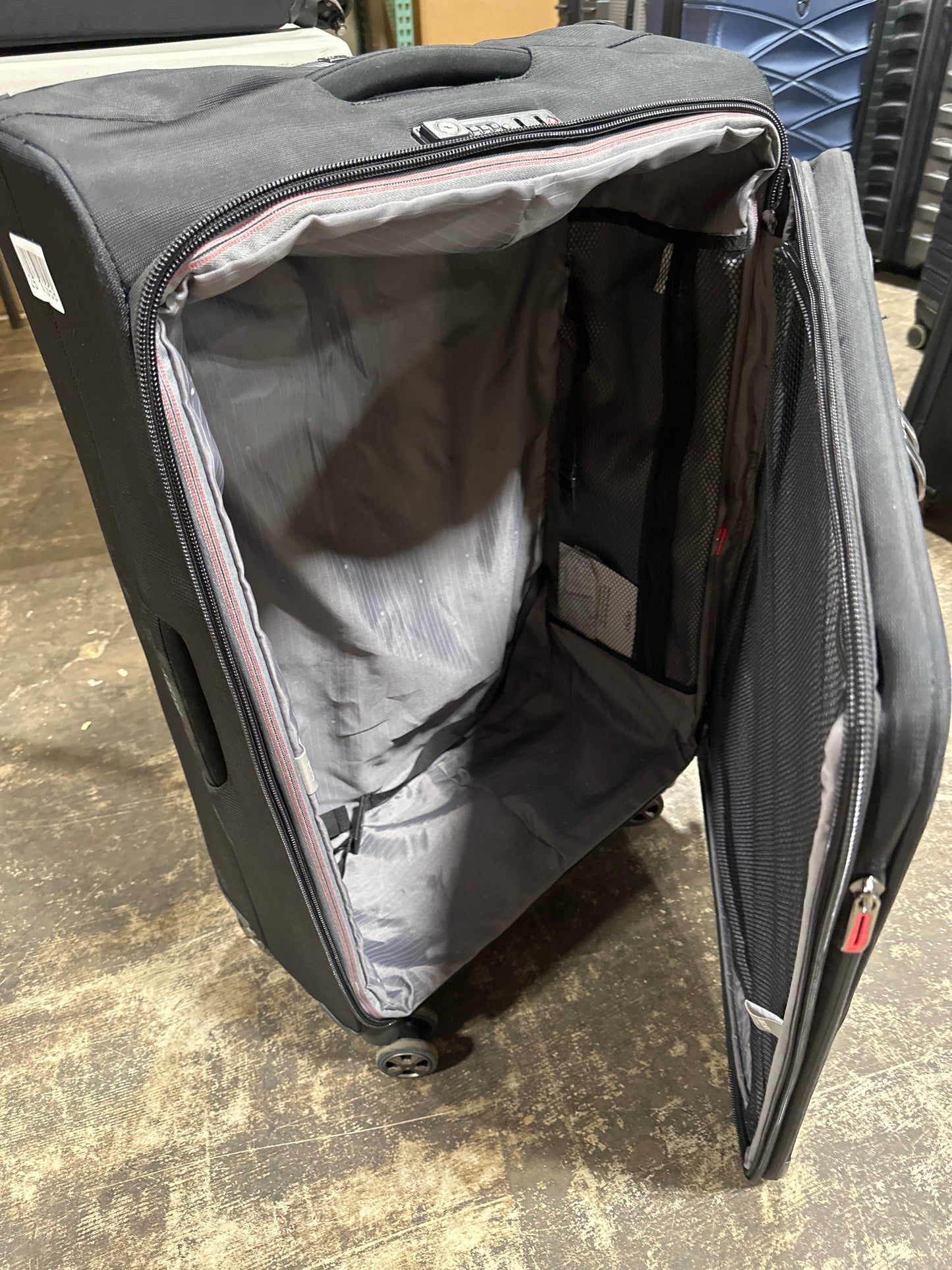 Damaged 30" Delsey Luggage