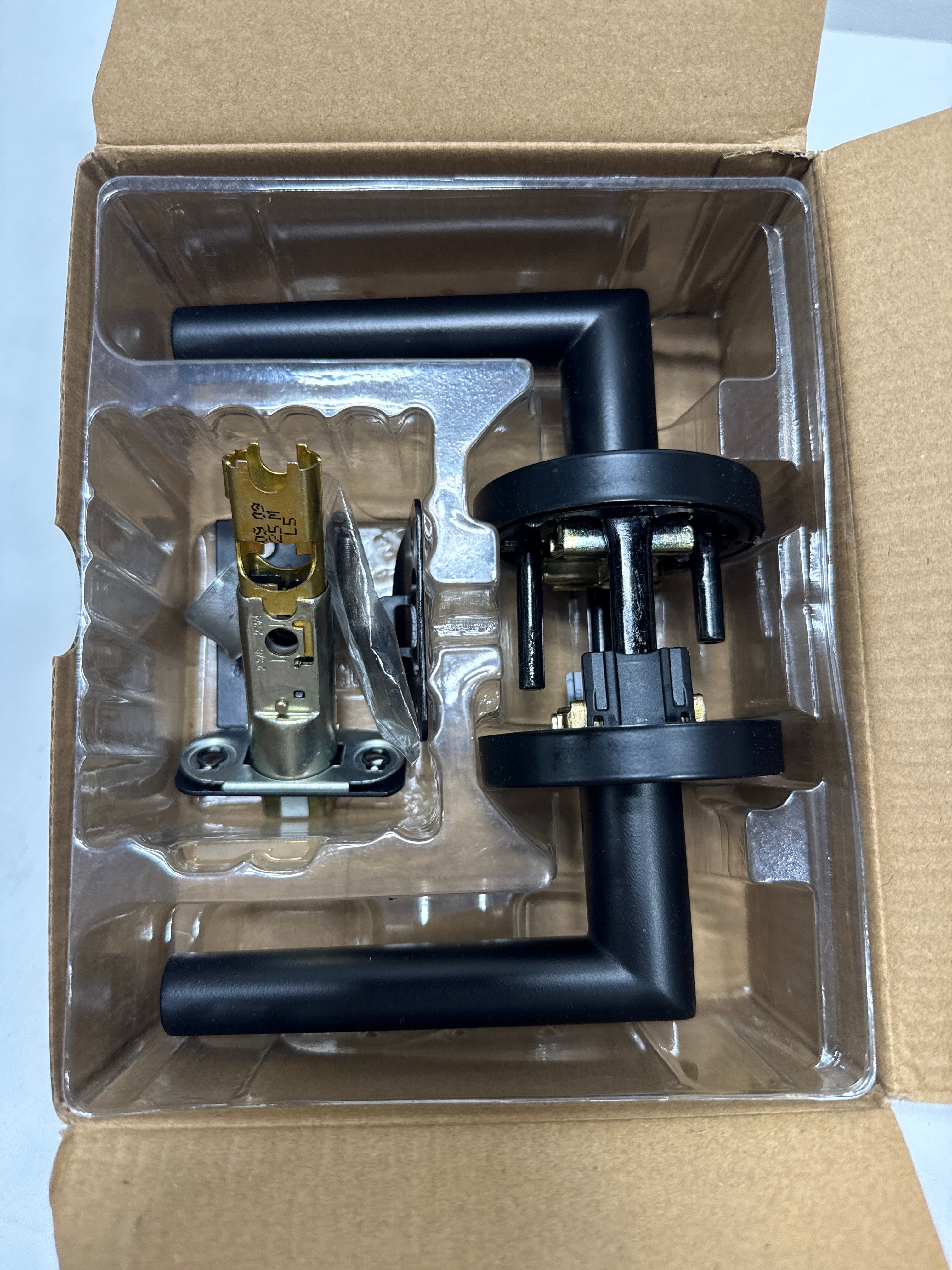 Kwikset Milan Interior Passage Door Handle, Lever For Closet and Hallway Doors, Reversible Non-Locking Handle Lever, Matte Black