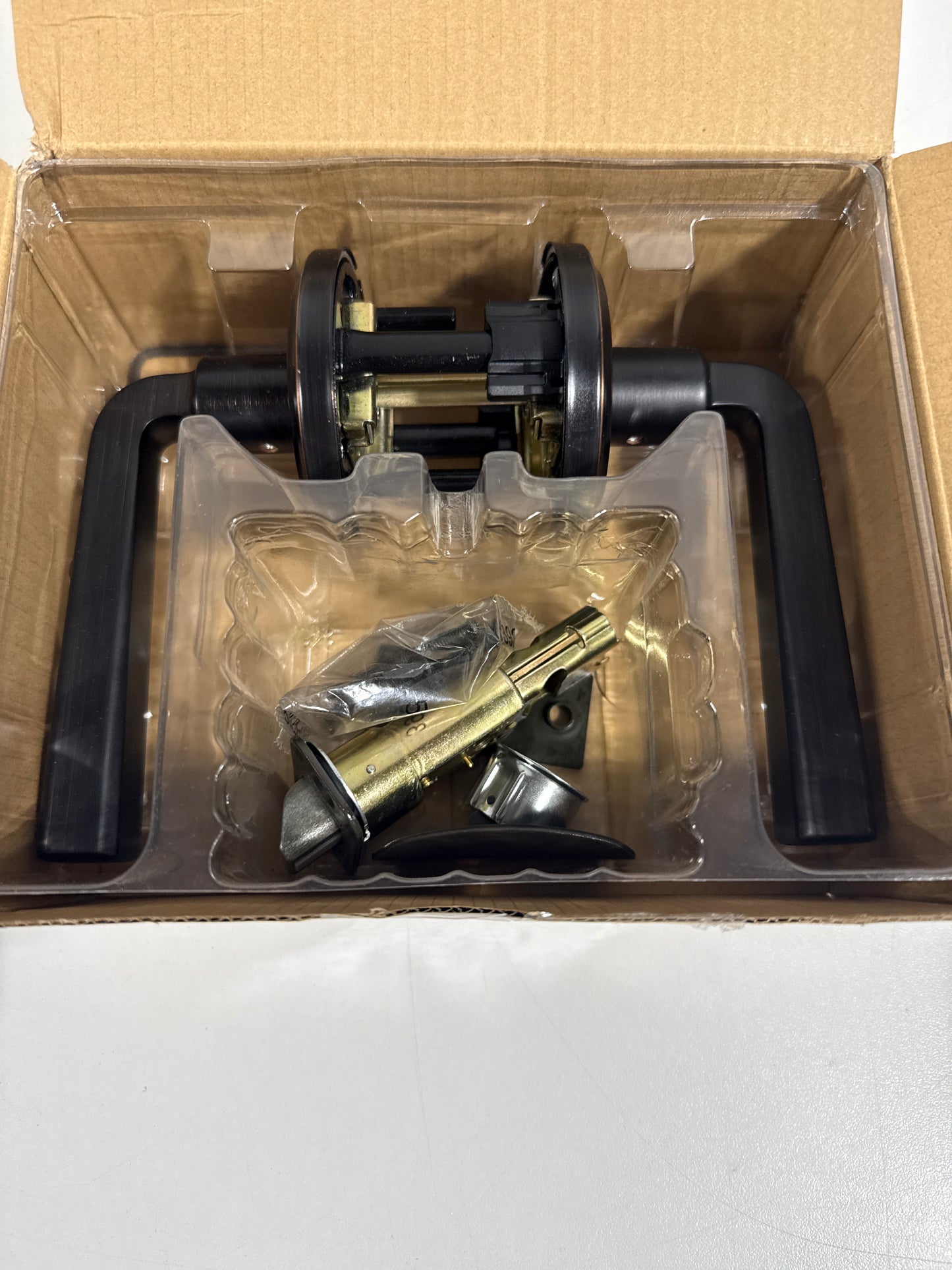 Trafford Lever Passage Door Lock with 6AL Latch and RCS Strike Venetian Bronze Finish