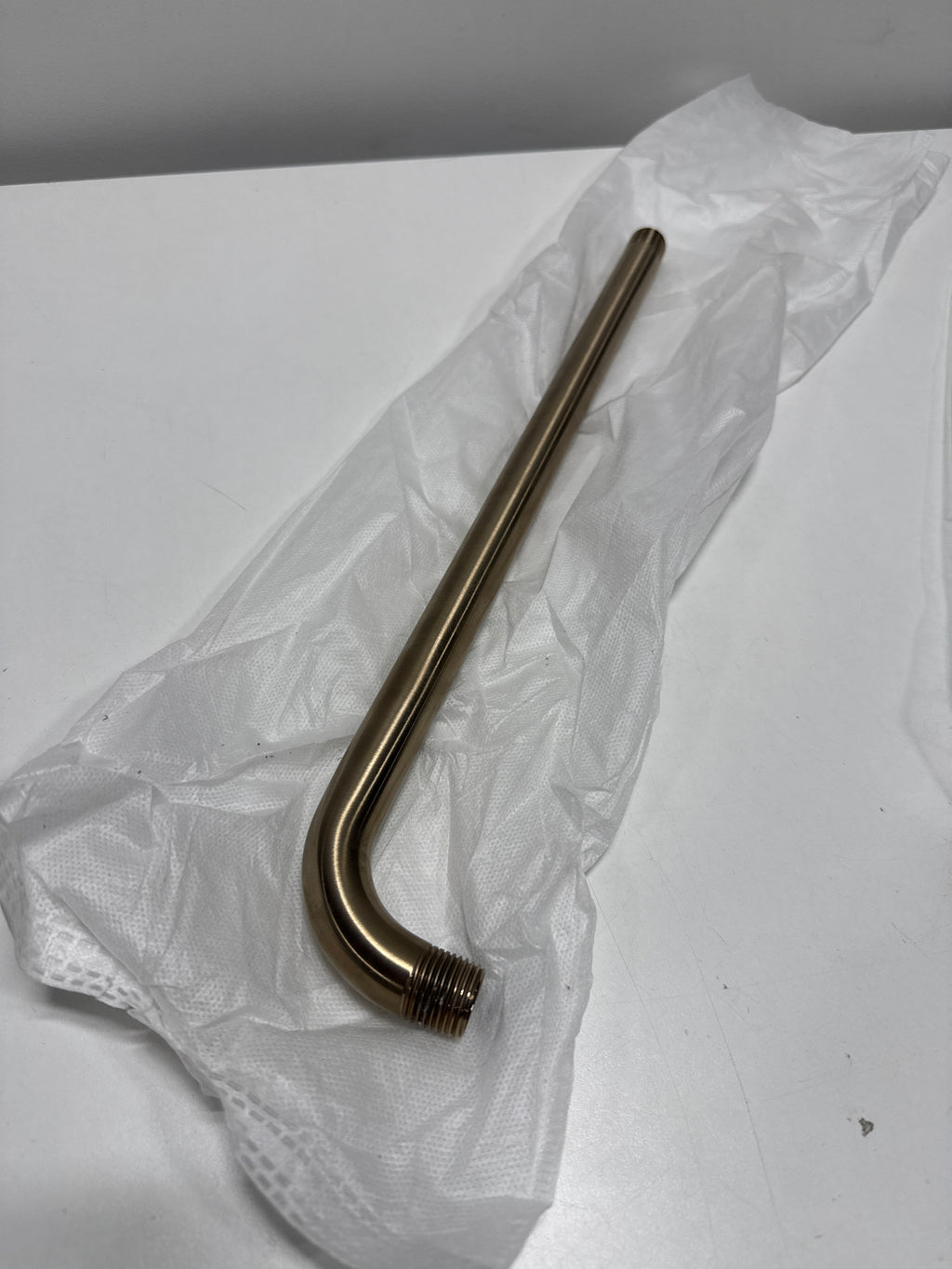 Scratch - Delta Faucet RP46870CZ Shower Arm, Champagne Bronze