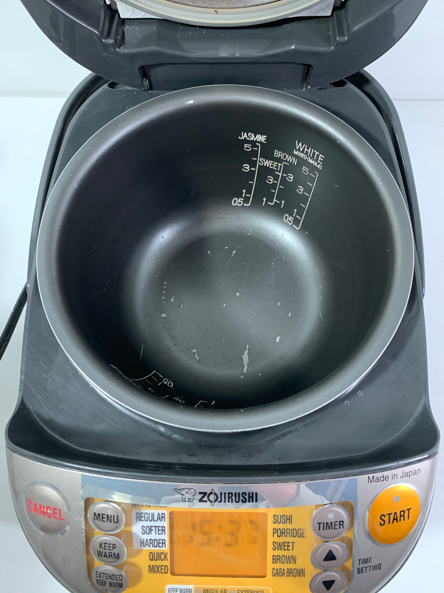 Used Zojirushi Induction Heating System Rice Cooker and Warmer (5.5-Cup) - Silver