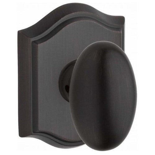 Baldwin PVELLTAR112 Reserve Privacy Ellipse with Traditional Arch Rose in Aged Bronze Finish