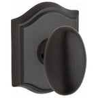 Baldwin PVELLTAR112 Reserve Privacy Ellipse with Traditional Arch Rose in Aged Bronze Finish