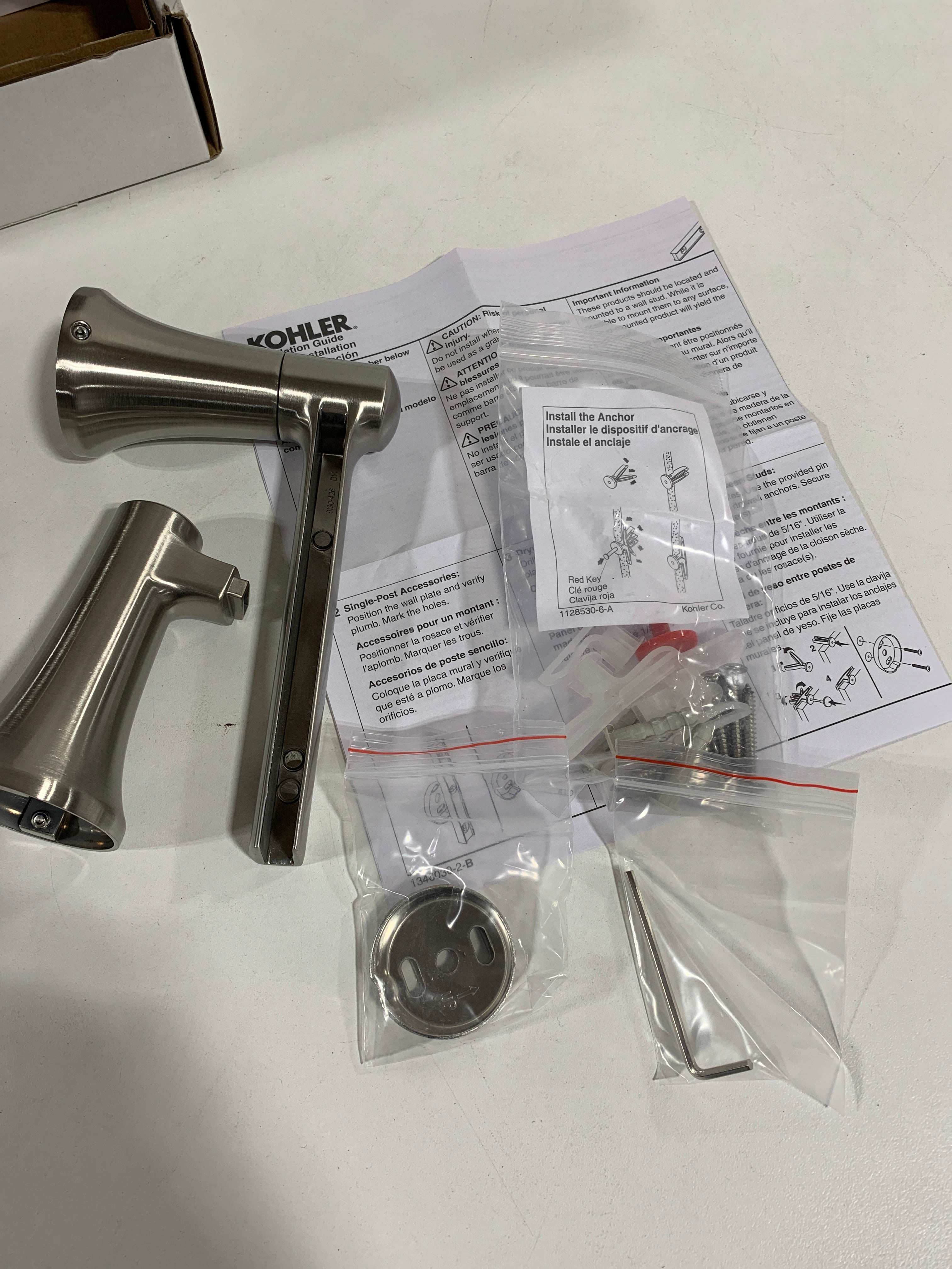 Kohler K-21954 Tempered Wall Mounted Pivoting Toilet Paper Holder