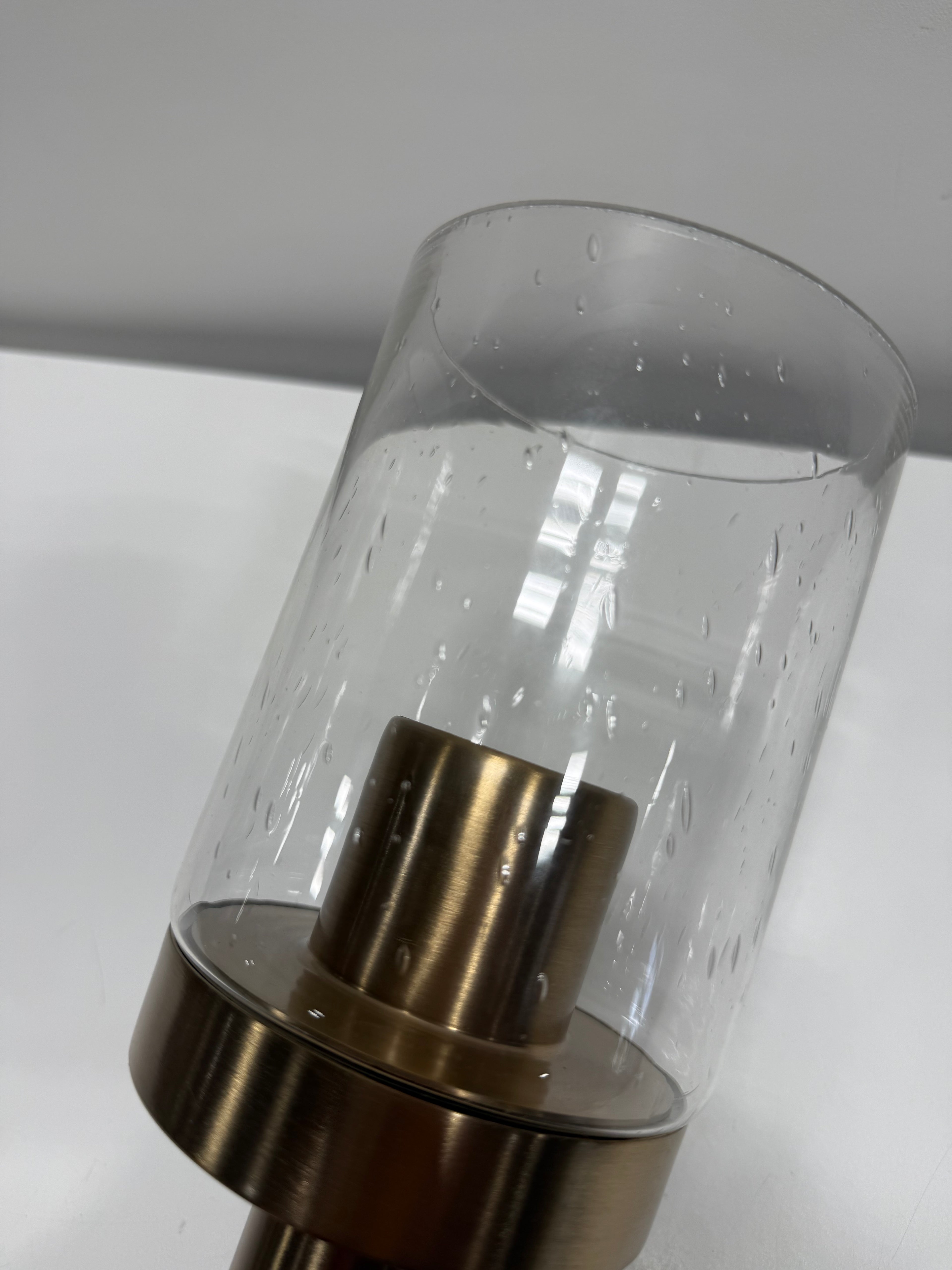 See Desc Champagne Bronze One Light Mini Pendant from the Madden Collection