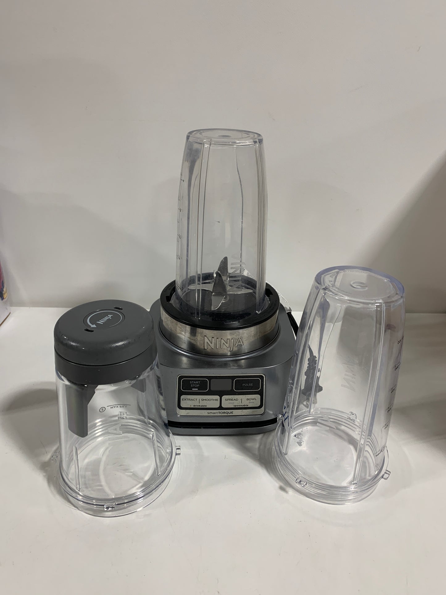 Used NINJA Foodi 24 Oz. 4-Speed Auto-iQ Stainless Steel Smoothie Bowl Maker and Nutrient Extractor Blender