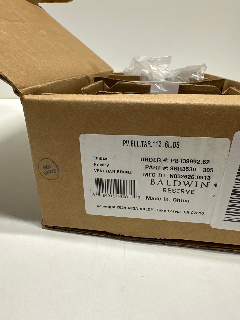 Baldwin PVELLTAR112 Reserve Privacy Ellipse with Traditional Arch Rose in Aged Bronze Finish