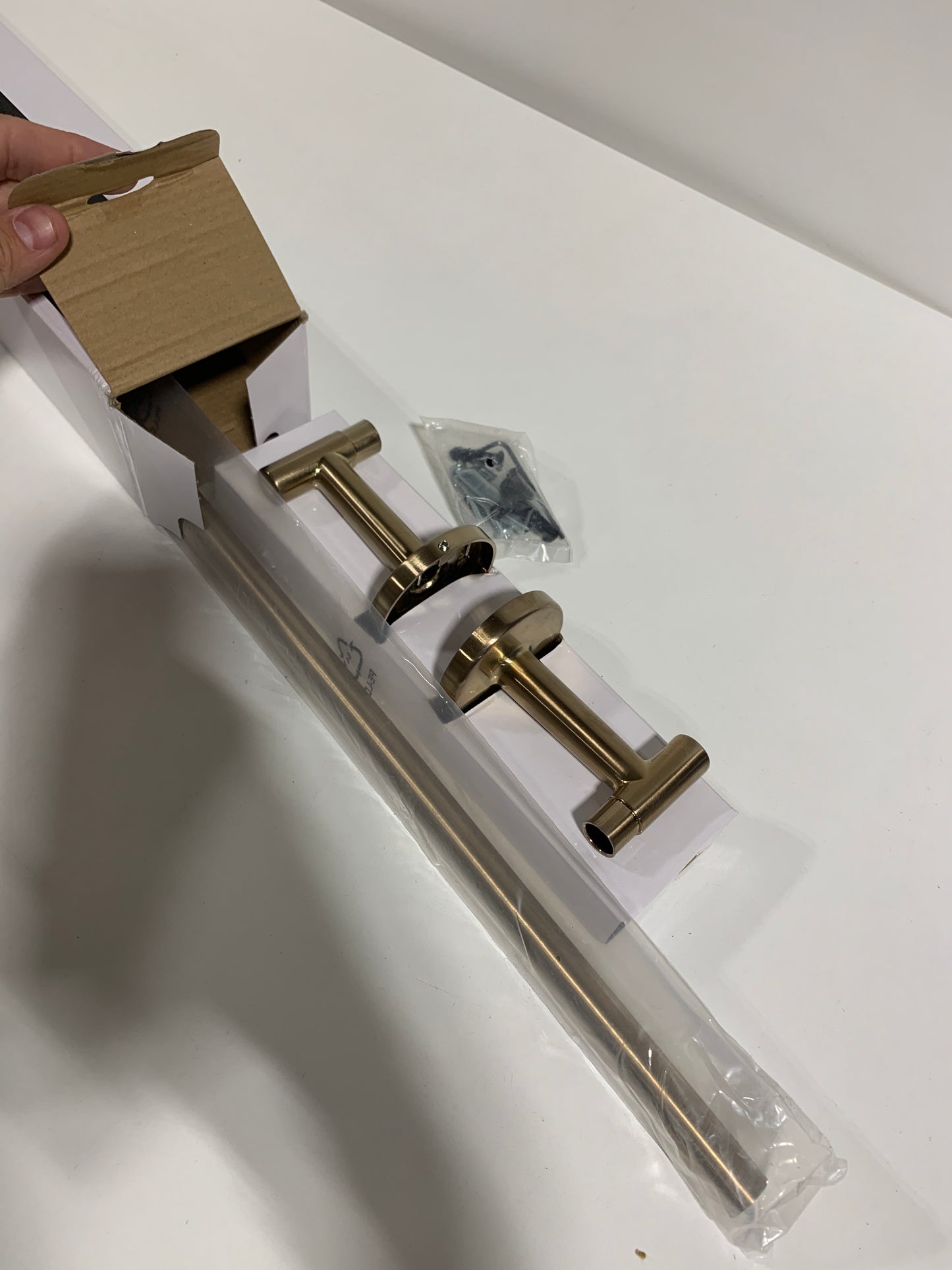 Trinsic 24 in. Towel Bar in Champagne Bronze