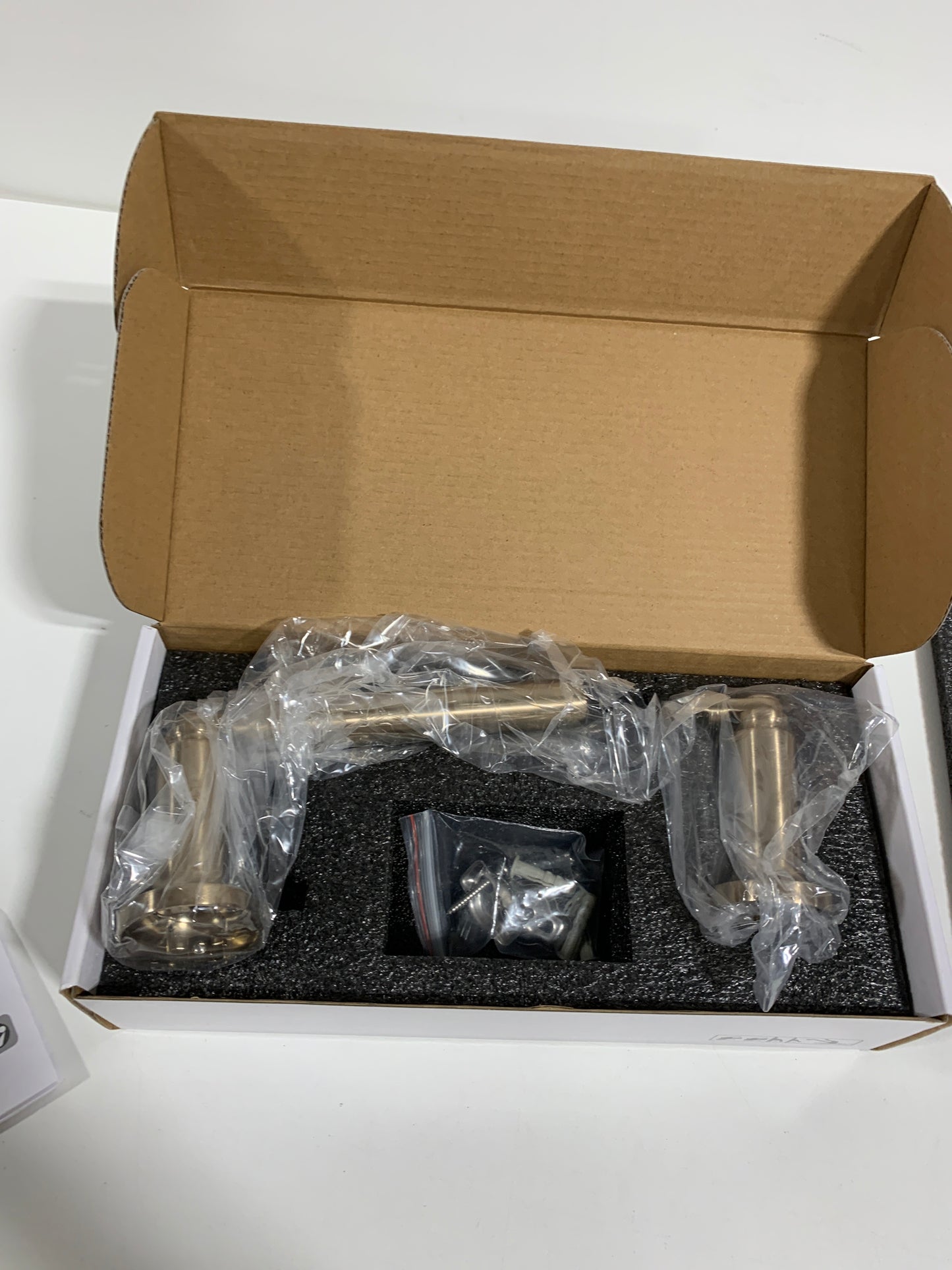 Delta 73550 Saylor Wall Mounted Pivoting Toilet Paper Holder Champagne Bronze