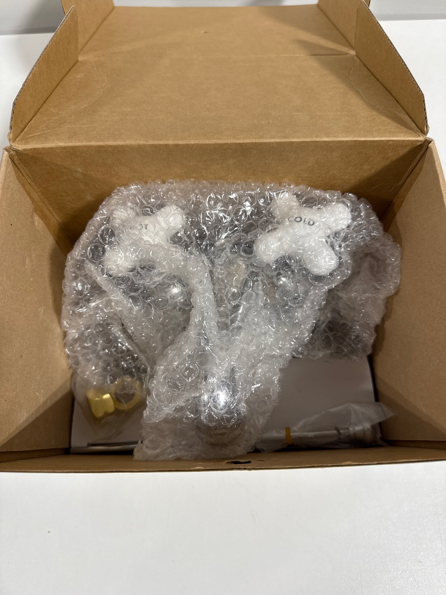 Signature Hardware 329378 Teapot Centerset Bathroom Faucet with Porcelain Cross Handles and Pop-Up Drain Assembly