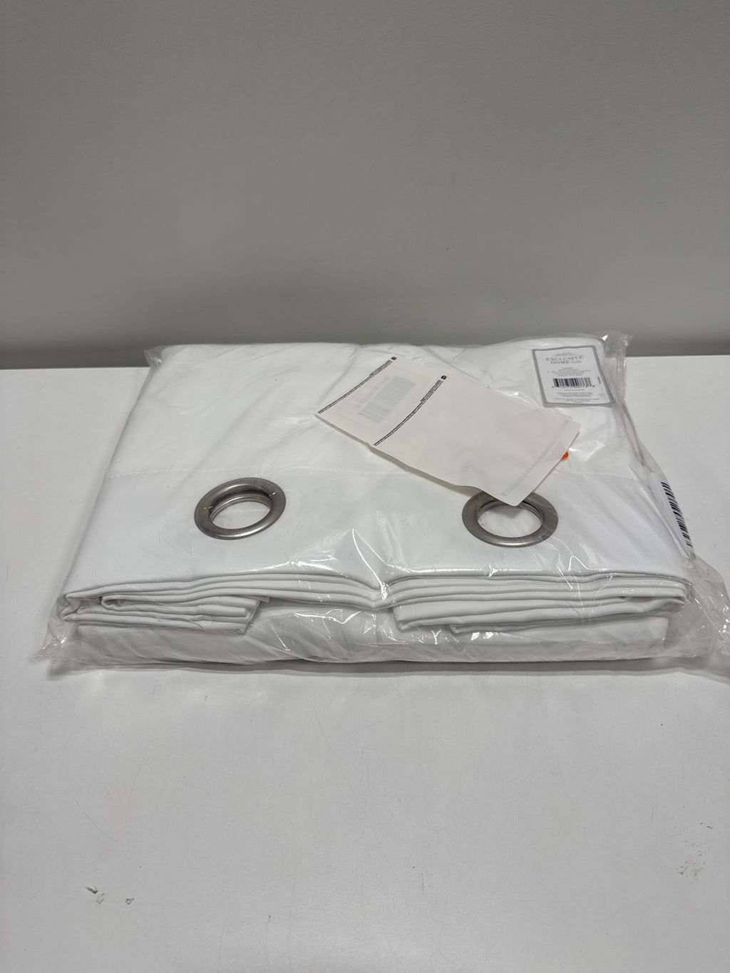 Exclusive Home Sateen Kids Twill Woven Room Darkening Blackout Grommet Top Curtain Panel Pair 52 X63 Winter White