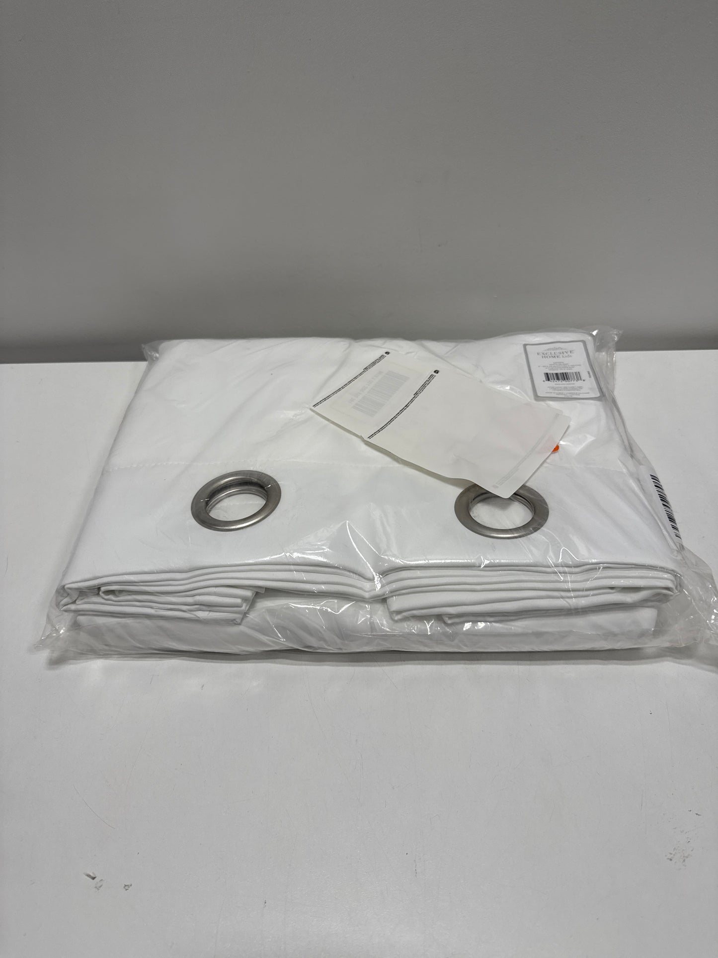 Exclusive Home Sateen Kids Twill Woven Room Darkening Blackout Grommet Top Curtain Panel Pair 52 X63 Winter White