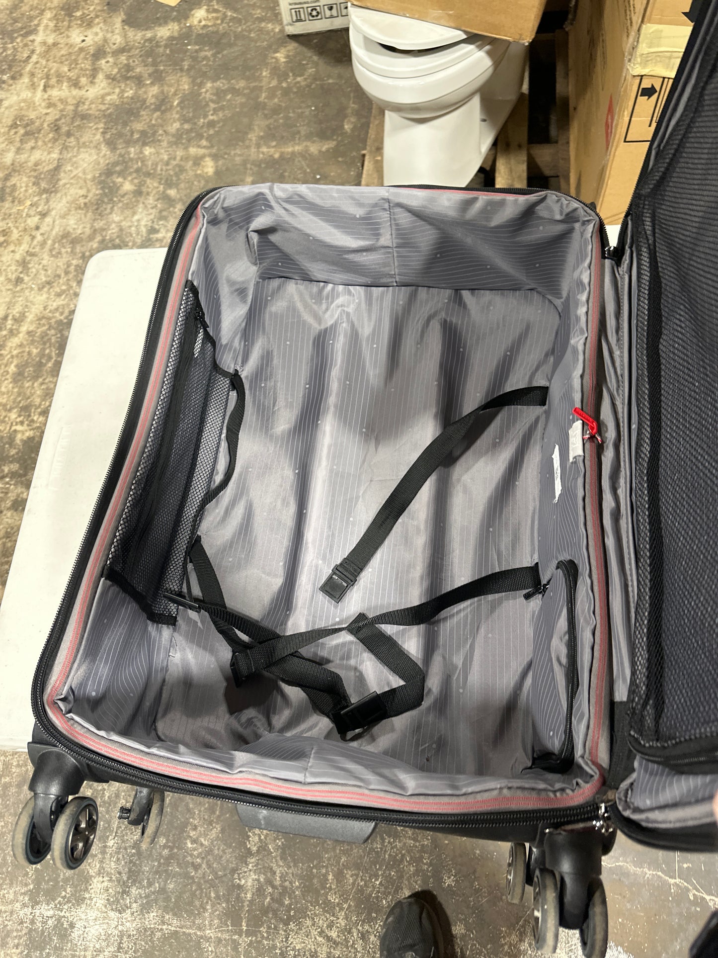 Damaged 30" Delsey Luggage