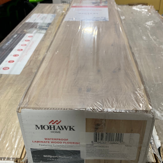 Mohawk Home 12MM Thick x 7. 1/8 in x 47.25in Laminate Wood Plank Flooring (18.14 sq ft/ctn)