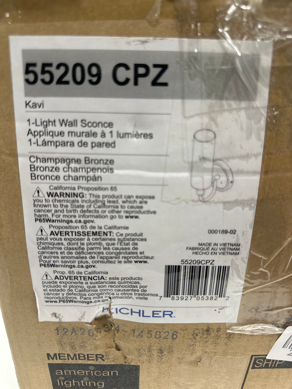 Kichler 55209 Kavi 13" Tall Bathroom Sconce with Clear Glass Shade Champagne Bronze