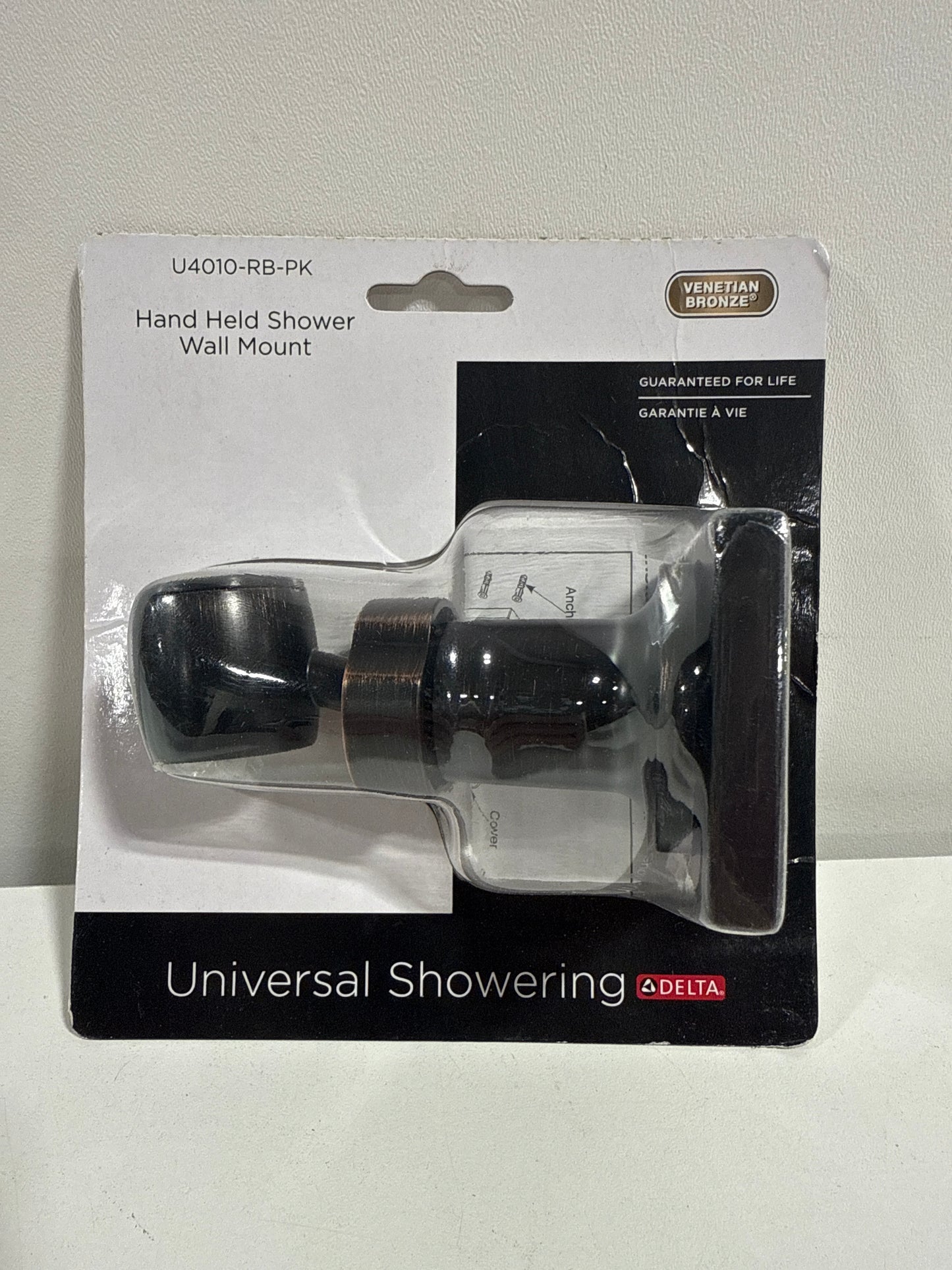 Delta Universal Showering Components: Adjustable Wall Mount for Hand Shower