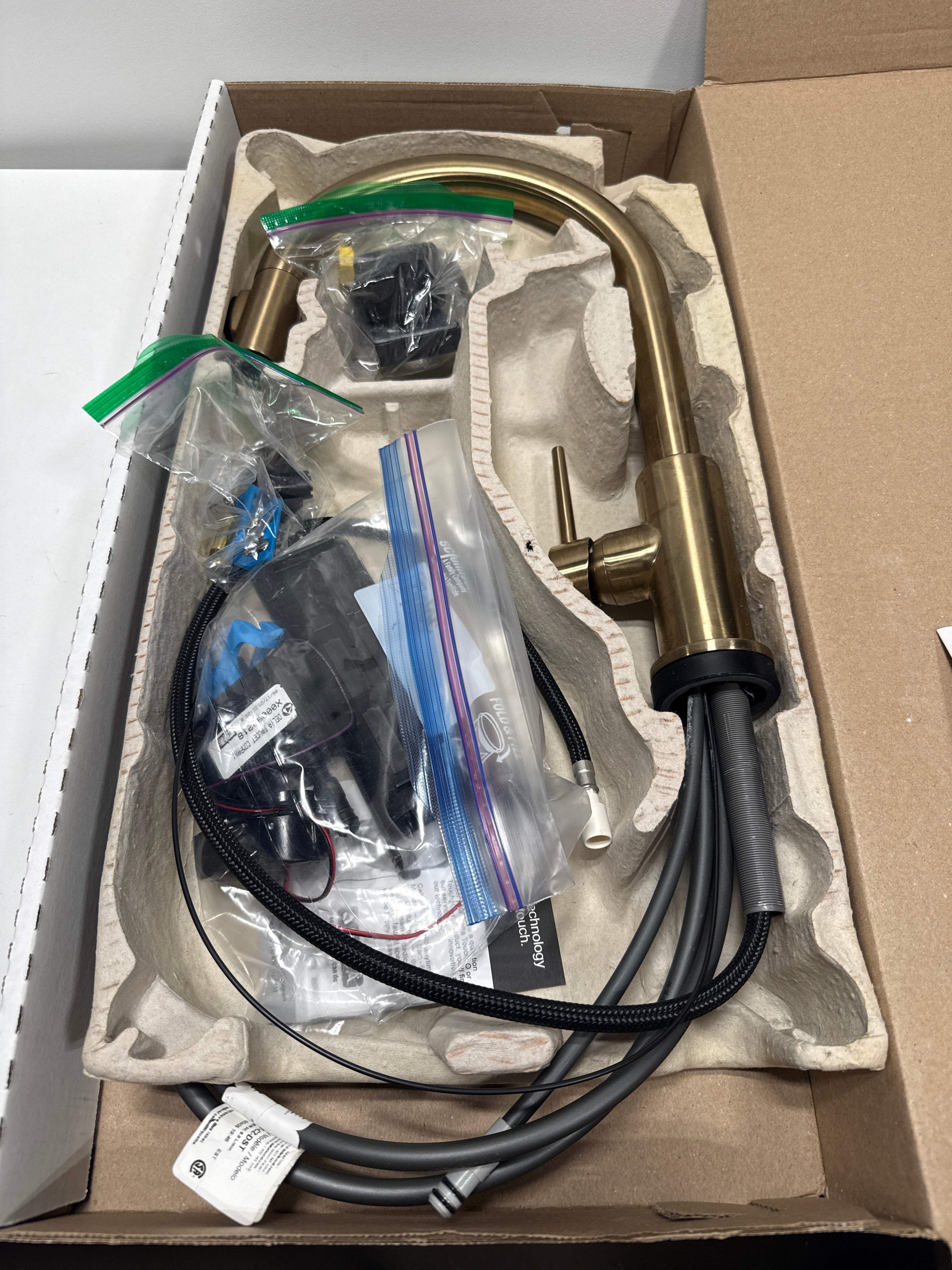 Used Delta Trinsic Single Handle Pull-Down Kitchen Faucet with Touch2O® Technology in Champagne Bronze 9159T-CZ-DST