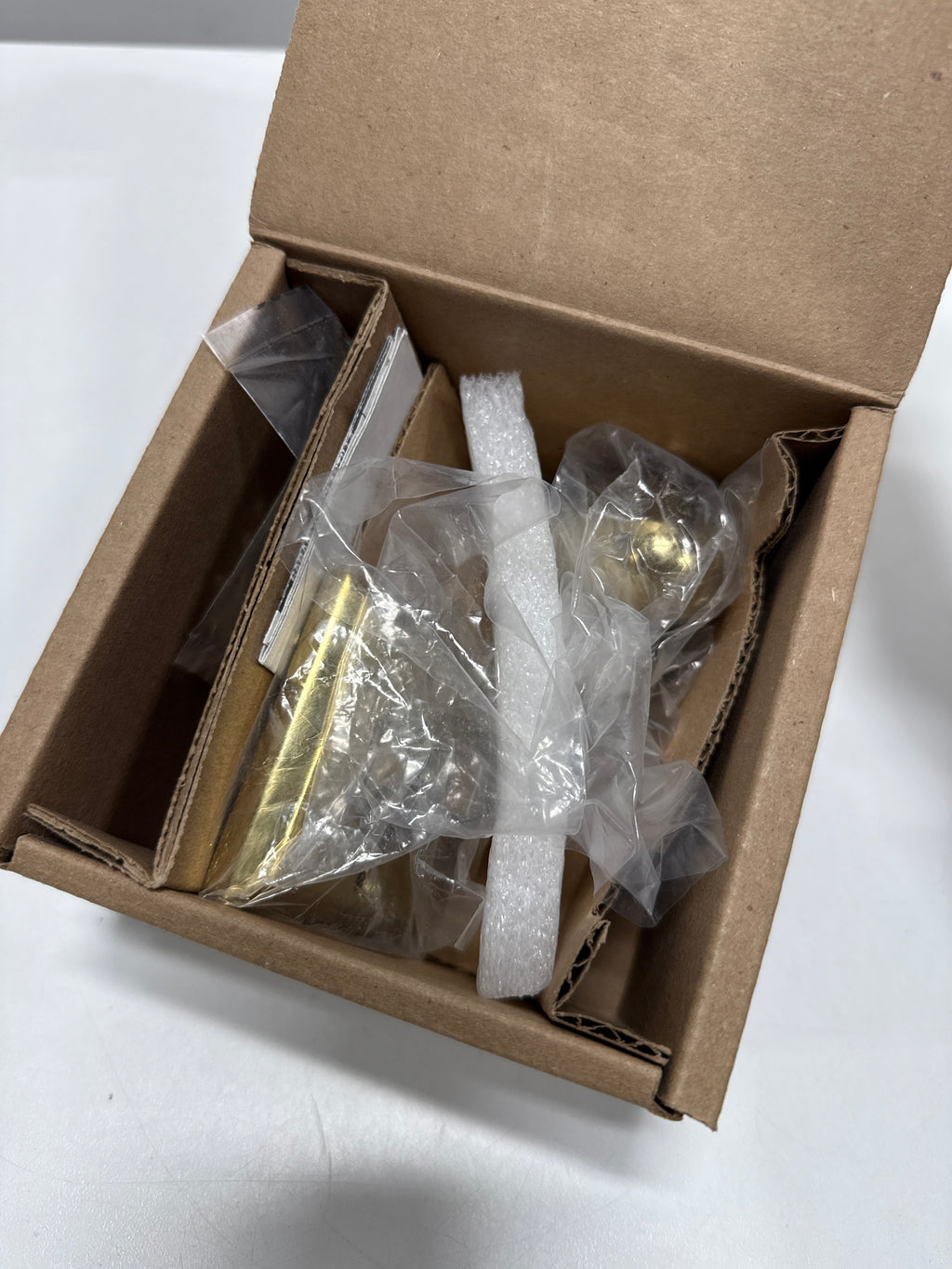 Baldwin HD.ELL.TSR Ellipse Non-Turning One-Sided Dummy Door Knob with Square Rose Lifetime Polished Brass