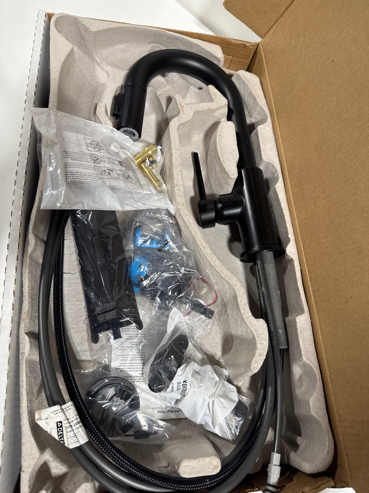 Used Trinsic Single-Handle Pull-Down Sprayer Bar Faucet Featuring Touch2O Technology in Matte Black