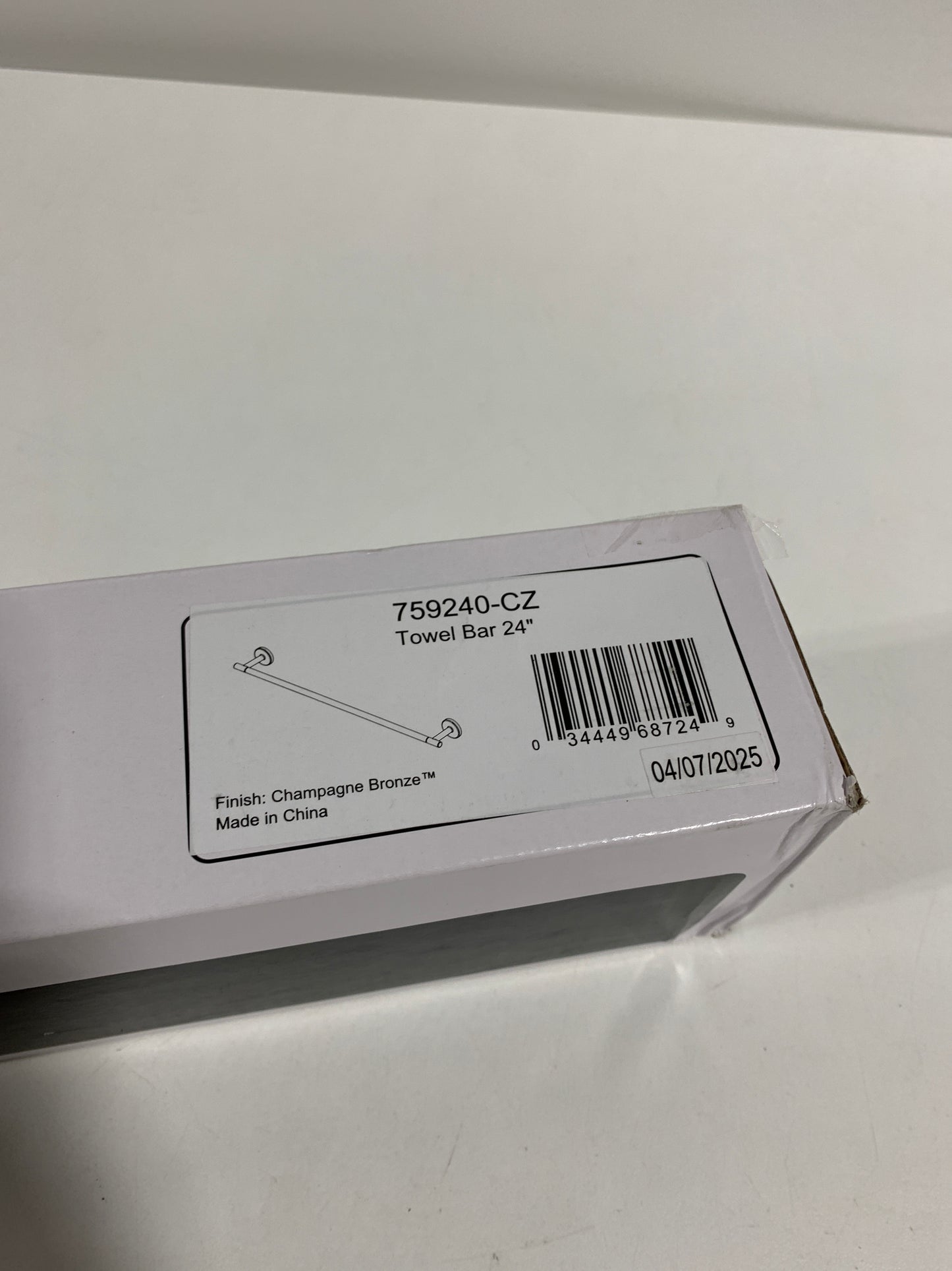 Trinsic 24 in. Towel Bar in Champagne Bronze