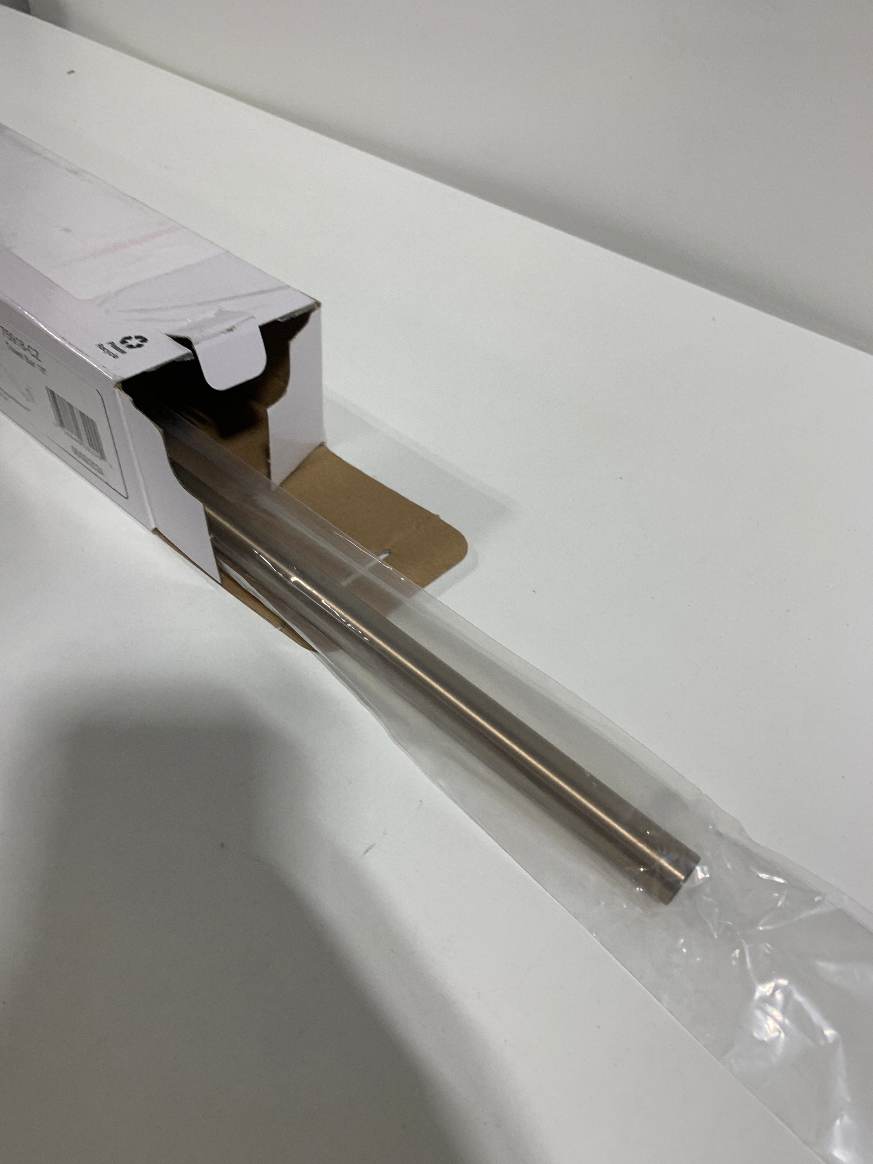 Trinsic 18 in. Towel Bar in Champagne Bronze