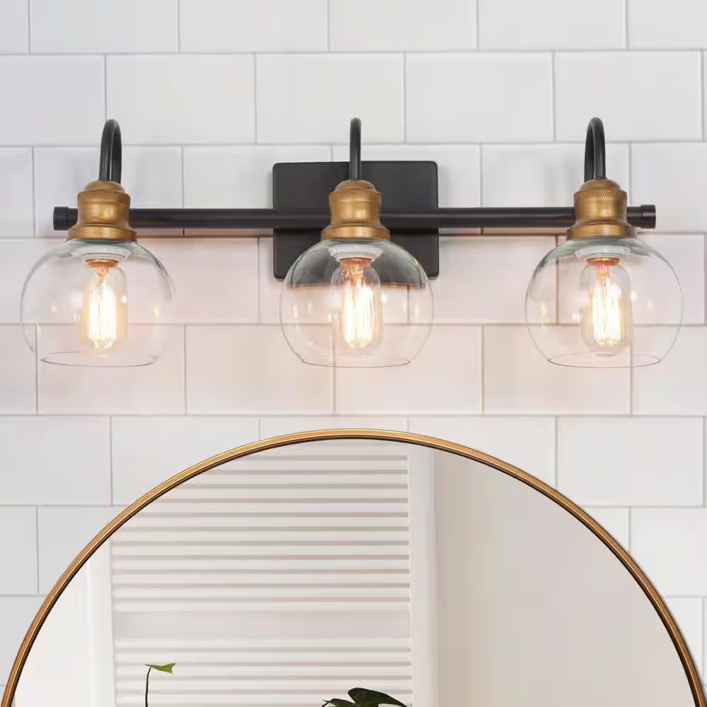 LNC 22.5 in. 3-Light Modern Aged Brass and Black Bathroom Vanity Light with Clear Glass Globe Shades Bathroom Sconce