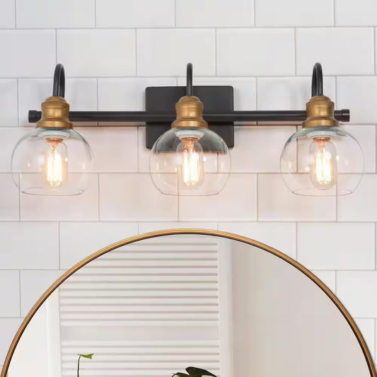 LNC 22.5 in. 3-Light Modern Aged Brass and Black Bathroom Vanity Light with Clear Glass Globe Shades Bathroom Sconce